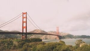 The golden gate bridge spans a bay.